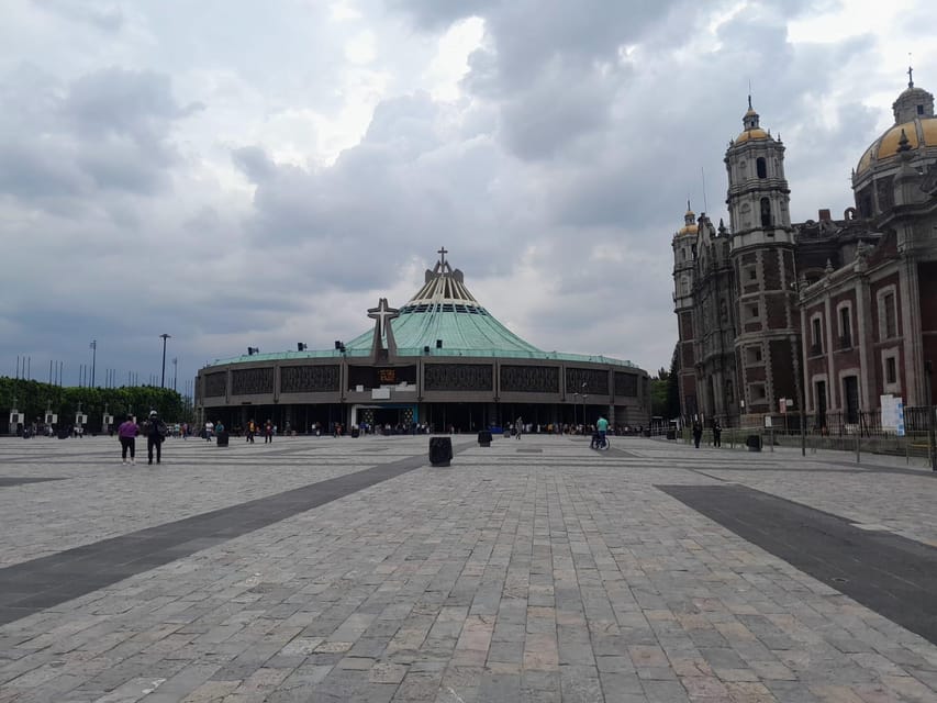Basilica de Guadalupe: Complete Walking Tour - Plaza de las Americas: pacing between churches