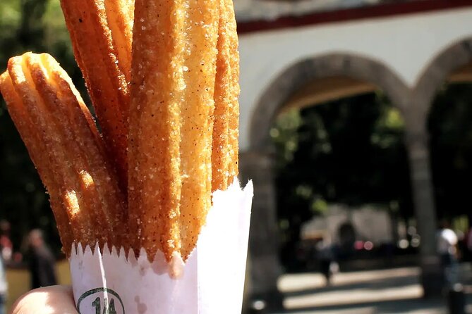 Frida Kahlo VIP [Museum Tickets Included] Walk, Markets & Churros - Jardin Centenario: San Juan Bautista Church Meets a Modern Sculpture