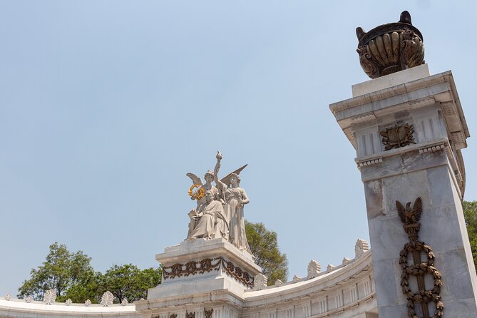 Guided Tour Zócalo to Palaces, Churches and Pyramids - Palacio de Bellas Artes: marble, details, and why the doors matter