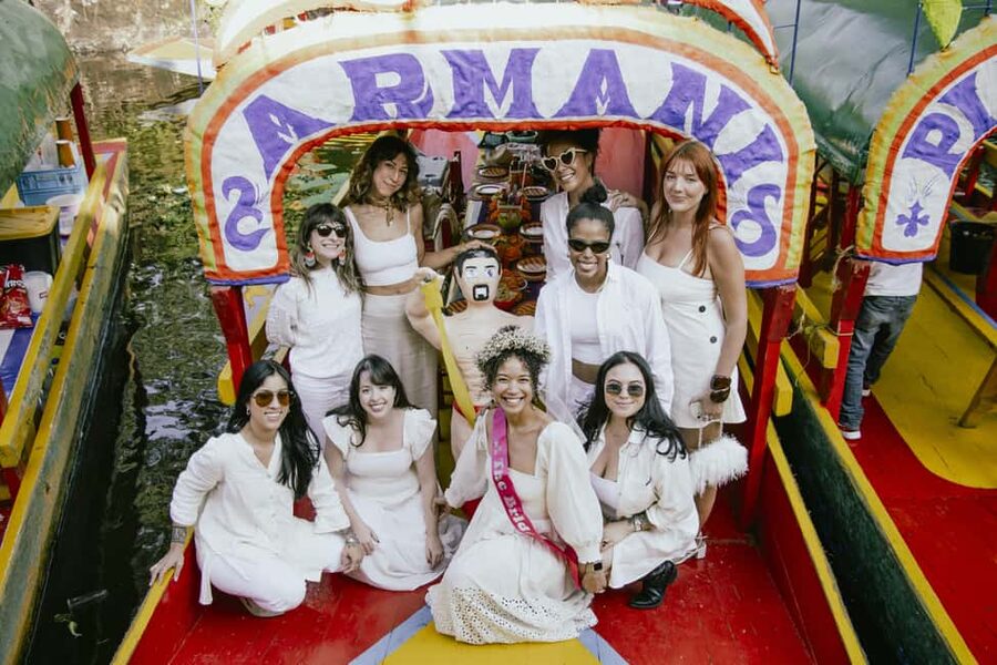 Mexico City: Xochimilco Boat with Guacamole & Premium Drinks - Music, hosting, and the social energy on the canals