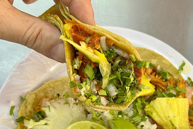 Mexico City Zocalo Tacos Tour by Michelin Starred Chef Torres - Stop 3 at Plaza Tolsa: Mezcal tasting with a sweet-and-creamy finish
