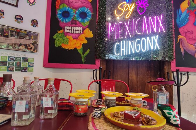 Private Tour: Lucha Libre + Tacos Michelin + Transportation - Stop 1: Mezcal tasting with chapulines and Oaxacan chocolate