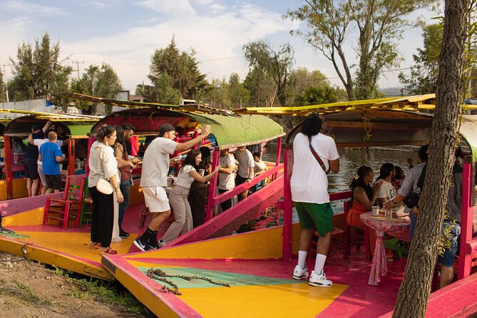 Xochimilco BOAT LIGHT PARTY WITH 1 DRINK AND 4 TAQUITOES + 18 - Xochimilco Night Vibes: What the 2-Hour Tr a jinera Party Feels Like