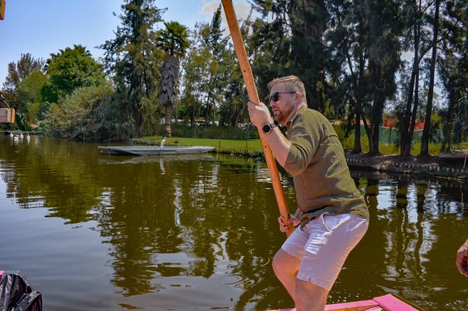 Xochimilco International boat party with open bar and tacos - The taco moment halfway through: a smart pause mid-party