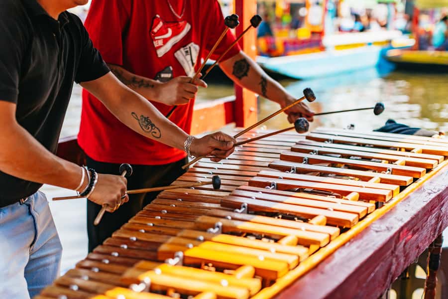 Xochimilco: traditional boat tour, culture, and fun. - Games, slang challenges, and music you can actually use